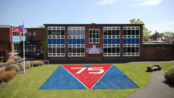 General view of a painting to commemorate the 75th anniversary of VE Day painted by staff of Barnton Primary School, following the outbreak of the coronavirus disease (COVID-19), Barnton, Britain, May 7, 2020. REUTERS/Molly Darlington - Sputnik International