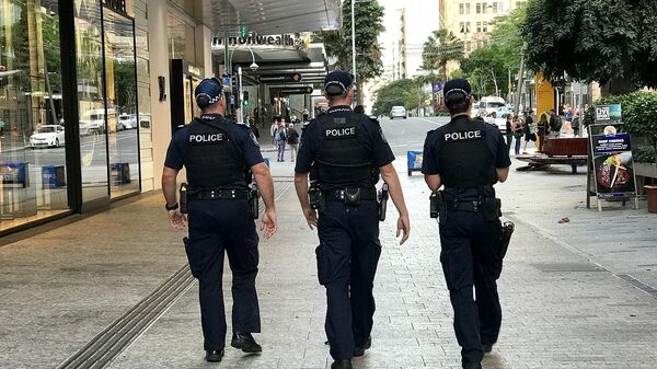 Police officers of Queensland Police Service, on the beat, in Brisbane Australia - Sputnik International