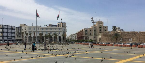 People are seen at Martyrs' Square following the outbreak of the coronavirus disease (COVID-19), during the holy month of Ramadan in Tripoli, Libya April 29, 2020 People are seen at Martyrs' Square following the outbreak of the coronavirus disease (COVID-19), during the holy month of Ramadan in Tripoli, Libya April 29, 2020 - Sputnik International