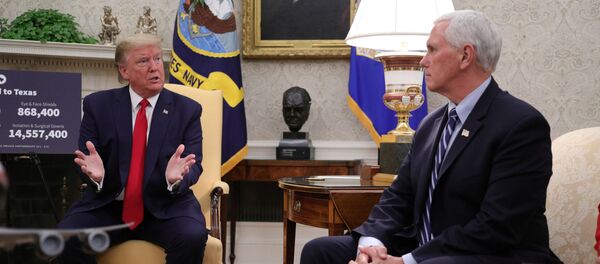 U.S. President Donald Trump speaks as Vice President Mike Pence looks on during a meeting with Texas Governor Greg Abbott about coronavirus disease (COVID-19) response in the Oval Office at the White House in Washington, U.S., May 7, 2020 - Sputnik International