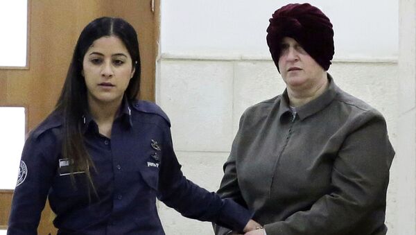 FILE - This Feb. 27, 2018 file photo, Australian Malka Leifer, right, is brought to a courtroom in Jerusalem. Leifer is wanted in Australia for 74 charges of sexual assault and the country's request for her extradition has been delayed for years - Sputnik International