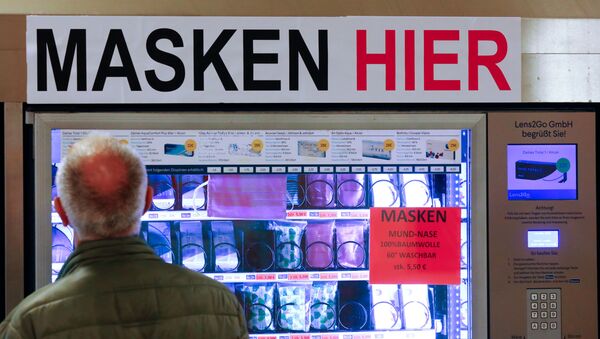 A vending machine, selling protective masks, is located in the subway station Zoologischer Garten, as the spread of the coronavirus disease (COVID-19) continues in Berlin, Germany, April 28, 2020. - Sputnik International