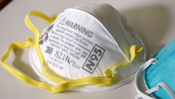 Various N95 respiration masks at a laboratory of 3M, which has been contracted by the U.S. government to produce extra masks in response to the country's novel coronavirus outbreak, in Maplewood, Minnesota, U.S. March 4, 2020 - Sputnik International