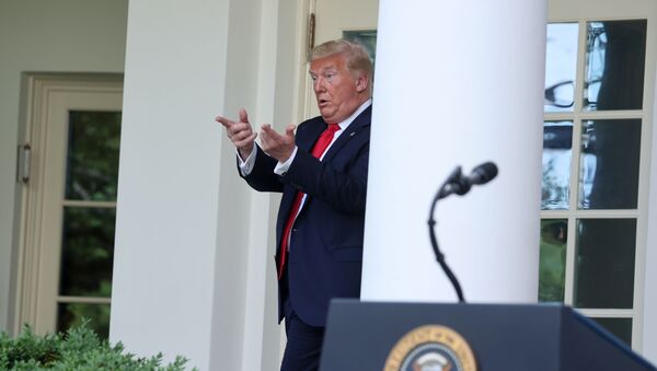 U.S. President Donald Trump beckons his guests to join him in the Oval Office after speaking about negotiations with pharmaceutical companies over the cost of insulin for U.S. seniors on Medicare at an event in the Rose Garden at the White House during the coronavirus disease (COVID-19) outbreak in Washington, U.S. May 26, 2020 - Sputnik International