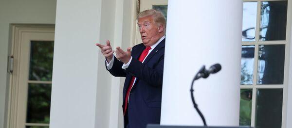 U.S. President Donald Trump beckons his guests to join him in the Oval Office after speaking about negotiations with pharmaceutical companies over the cost of insulin for U.S. seniors on Medicare at an event in the Rose Garden at the White House during the coronavirus disease (COVID-19) outbreak in Washington, U.S. May 26, 2020 - Sputnik International