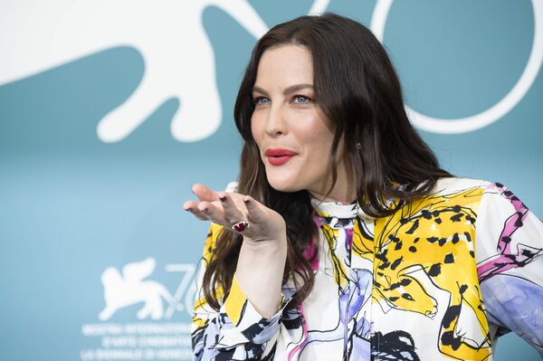 Actress Liv Tyler poses for photographers at the photo call for the film 'Ad Astra' at the 76th edition of the Venice Film Festival in Venice, Italy, Thursday, Aug. 29, 2019. - Sputnik International