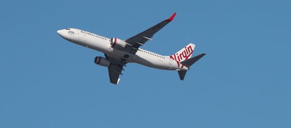 A Virgin Australia Airlines plane takes off from Kingsford Smith International Airport in Sydney, Australia, March 18, 2020 A Virgin Australia Airlines plane takes off from Kingsford Smith International Airport in Sydney, Australia, March 18, 2020 - Sputnik International