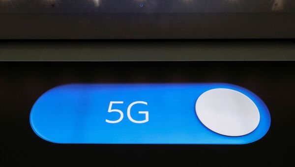 An advertising board shows a 5G logo at the International Airport in Zaventem, Belgium May 4, 2020. Picture taken May 4, 2020 - Sputnik International
