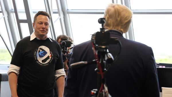 U.S. President Donald Trump and Elon Musk are seen at the Firing Room Four after the launch of a SpaceX Falcon 9 rocket and Crew Dragon spacecraft on NASA's SpaceX Demo-2 mission to the International Space Station from NASA's Kennedy Space Center in Cape Canaveral, Florida, U.S. May 30, 2020.  - Sputnik International