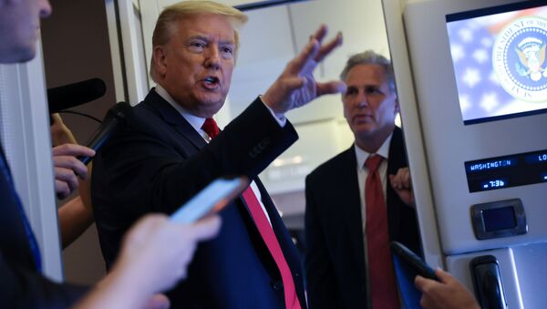 U.S. President Donald Trump, with U.S. House Minority Leader Kevin McCarthy (R-CA), speaks to reporters aboard Air Force One while returning to Washington  from Cape Canaveral, Florida, U.S. May 30, 2020. - Sputnik International
