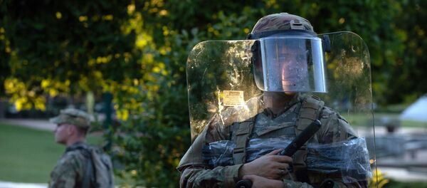 The National Guard protected a barricaded Centennial Olympic Park in Downtown Atlanta during a protest against the death in Minneapolis police custody of African-American man George Floyd, in Atlanta, Georgia, U.S. May 30, 2020 - Sputnik International