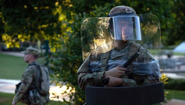 The National Guard protected a barricaded Centennial Olympic Park in Downtown Atlanta during a protest against the death in Minneapolis police custody of African-American man George Floyd, in Atlanta, Georgia, U.S. May 30, 2020 - Sputnik International