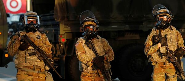 Members of the National Guard secure the area during a protest against the death in Minneapolis police custody of African-American man George Floyd, in Minneapolis, Minnesota, U.S., May 29, 2020. - Sputnik International
