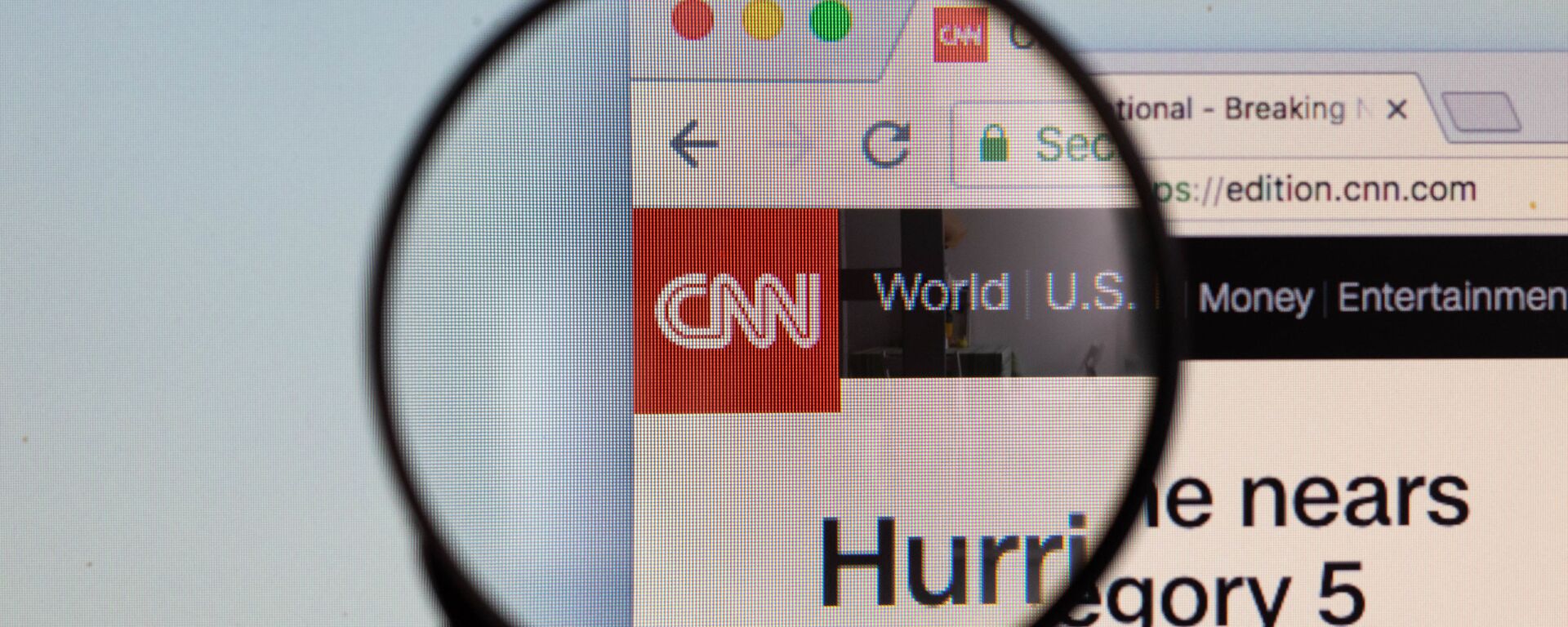 CNN logo on a computer screen with a magnifying glass - Sputnik International, 1920, 05.06.2021