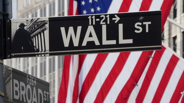 The Wall Street sign is pictured at the New York Stock exchange (NYSE) in the Manhattan borough of New York City, New York, U.S., March 9, 2020. - Sputnik International