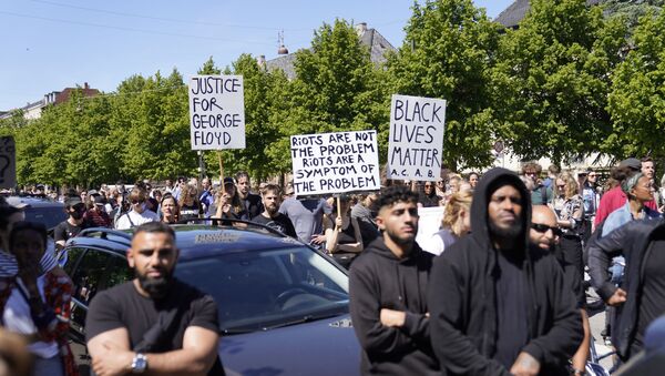 People demonstrate in front of the US Embassy in Copenhagen, Denmark, on May 31, 2020, to express their feelings in regard to the death of 46 year old George Floyd, an unarmed black man who died during his arrest in Minneapolis on May 25, 2020.  - Sputnik International