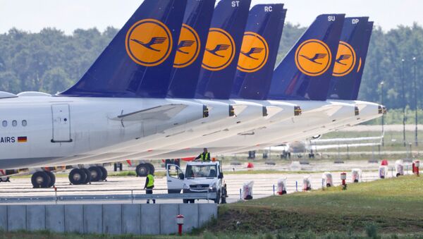 FILE PHOTO: Airplanes of German carrier Lufthansa are parked at the Berlin Schoenefeld airport, amid the spread of the coronavirus disease (COVID-19) in Schoenefeld, Germany, May 26, 2020 - Sputnik International