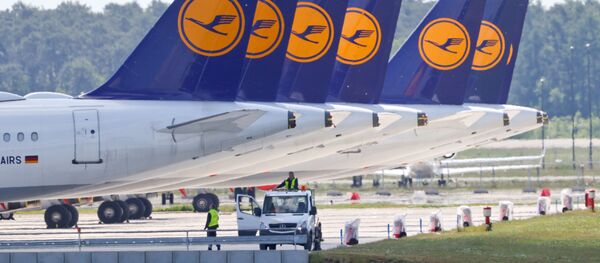 FILE PHOTO: Airplanes of German carrier Lufthansa are parked at the Berlin Schoenefeld airport, amid the spread of the coronavirus disease (COVID-19) in Schoenefeld, Germany, May 26, 2020 - Sputnik International