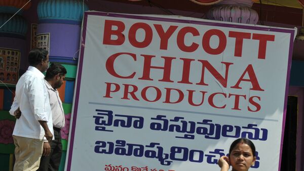 Members of the Ganesh Utsav Committee stand alongside a poster declaring 'Boycott China Products' in Hyderabad on November 3, 2016. - Sputnik International