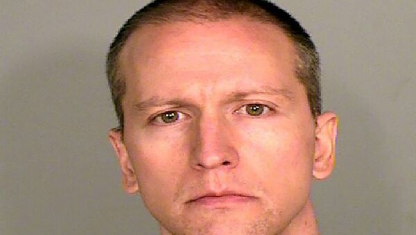 This photo provided by the Ramsey County Sheriff's Office shows former Minneapolis police Officer Derek Chauvin, who was arrested Friday, May 29, 2020, in the Memorial Day death of George Floyd. Chauvin was charged with third-degree murder and second-degree manslaughter after a shocking video of him kneeling for nearly nine minutes on the neck of Floyd, a black man, set off a wave of protests across the country. (Courtesy of Ramsey County Sheriff's Office via AP) - Sputnik International