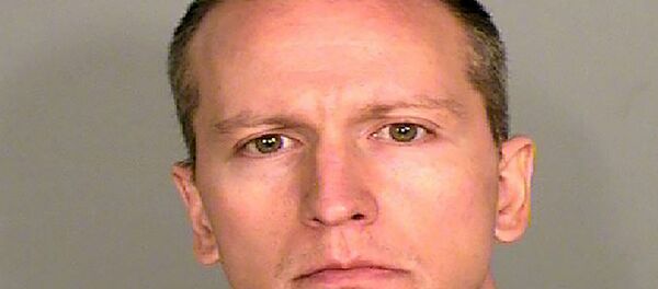 This photo provided by the Ramsey County Sheriff's Office shows former Minneapolis police Officer Derek Chauvin, who was arrested Friday, May 29, 2020, in the Memorial Day death of George Floyd. Chauvin was charged with third-degree murder and second-degree manslaughter after a shocking video of him kneeling for nearly nine minutes on the neck of Floyd, a black man, set off a wave of protests across the country. (Courtesy of Ramsey County Sheriff's Office via AP) - Sputnik International