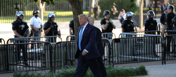 U.S. President Donald Trump walks through Lafayette Park to visit St. John's Episcopal Church across from the White House during ongoing protests over racial inequality in the wake of the death of George Floyd while in Minneapolis police custody, in the Rose Garden at the White House in Washington, U.S., June 1, 2020 - Sputnik International