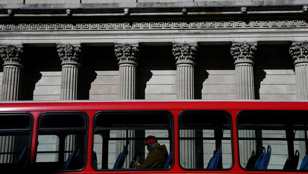 A quiet bus passes the Bank of England, as the spread of the coronavirus disease (COVID-19) continues, in London, Britain, March 23, 2020 - Sputnik International
