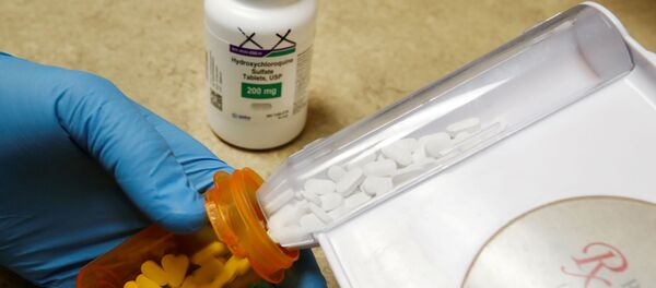 The drug hydroxychloroquine, pushed by U.S. President Donald Trump and others in recent months as a possible treatment to people infected with the coronavirus disease (COVID-19), is displayed by a pharmacist at the Rock Canyon Pharmacy in Provo, Utah, U.S., May 27, 2020 - Sputnik International