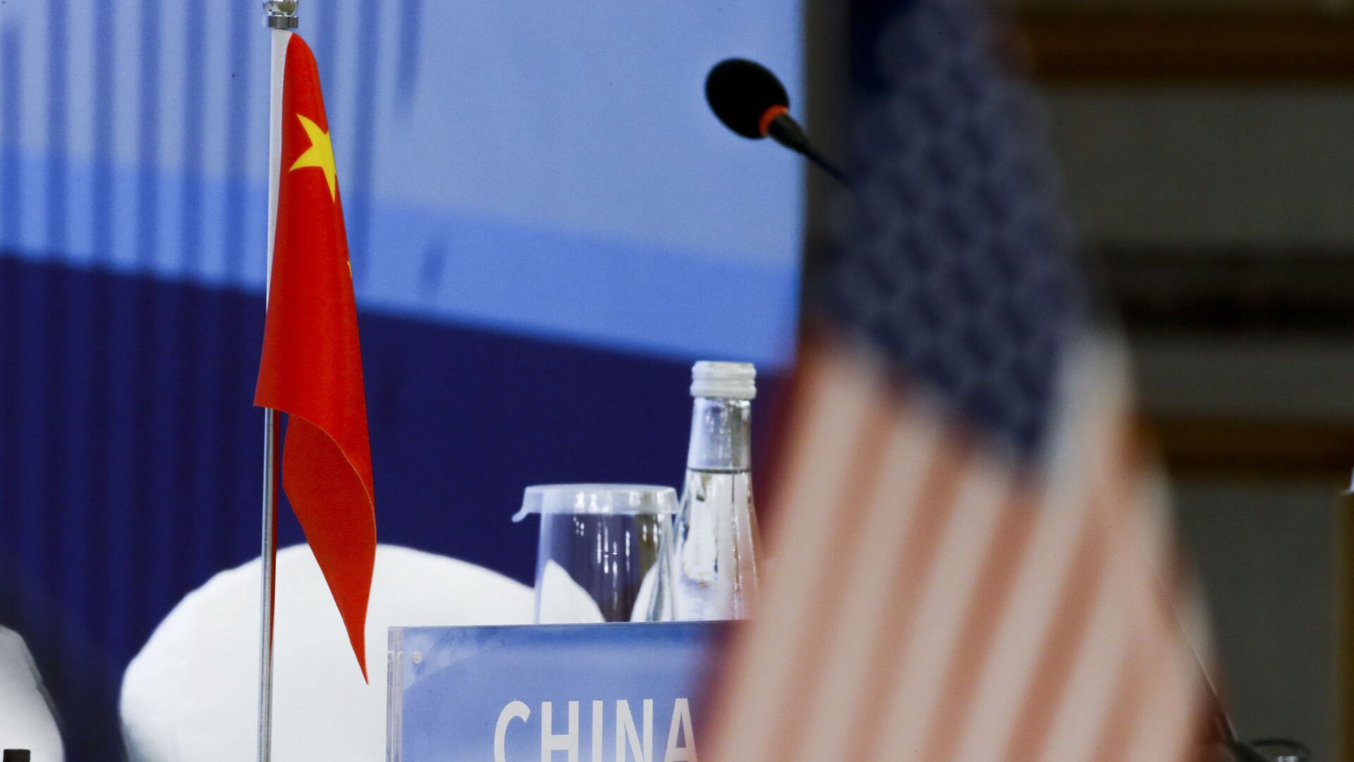 The Chinese and U.S. national flags are seen before the start of a Treaty on the Non-Proliferation of Nuclear Weapons (NPT) conference in Beijing of the UN Security Council's five permanent members (P5) China, France, Russia, the United Kingdom, and the United States, China, Wednesday, Jan. 30, 2019.  - Sputnik International, 1920, 18.03.2022