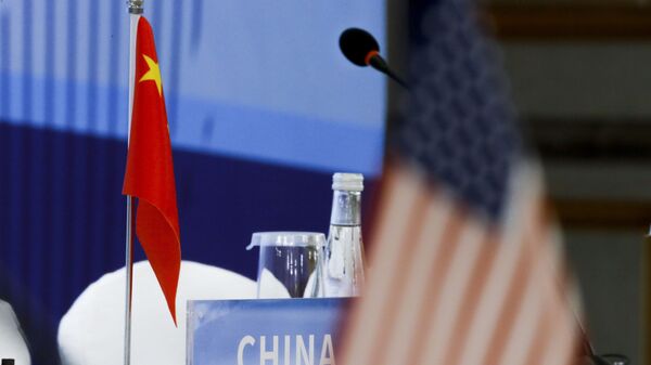 The Chinese and U.S. national flags are seen before the start of a Treaty on the Non-Proliferation of Nuclear Weapons (NPT) conference in Beijing of the UN Security Council's five permanent members (P5) China, France, Russia, the United Kingdom, and the United States, China, Wednesday, Jan. 30, 2019.  - Sputnik International