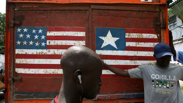 The US and Liberian flags on display in Monrovia, the capital of Liberia - Sputnik International
