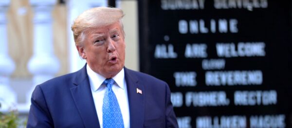 U.S. President Donald Trump holds a Bible as he talks to the media while standing in front of St. John's Episcopal Church across from the White House after walking there for a photo opportunity during ongoing protests over racial inequality in the wake of the death of George Floyd while in Minneapolis police custody, outside the White House in Washington, U.S., June 1, 2020 - Sputnik International