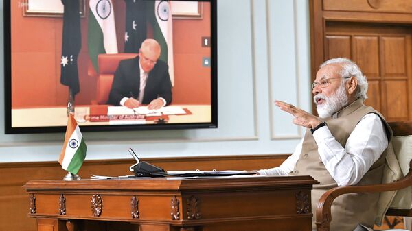 In this handout photo provided by the Press Information Bureau, Indian Prime Minister Narendra Modi speaks during a virtual meeting with Australian Prime Minister Scott Morrison, in New Delhi, India, Thursday, June 4, 2020 - Sputnik International