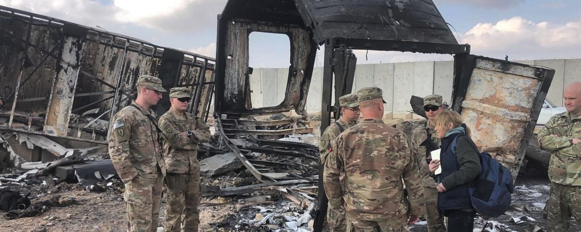 US Soldiers stand amid damage at a site of an Iranian bombing at Ain al-Asad Air Base, in Anbar, Iraq, Monday, 13 January 2020. Ain al-Asad Air Base was struck by a barrage of Iranian missiles on Wednesday, in retaliation for the US drone strike that killed a top Iranian commander, General Qassem Soleimani, whose killing raised fears of a wider war in the Middle East.  - Sputnik International, 1920, 17.12.2021