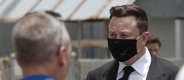 CEO of SpaceX, Elon Musk, talks to the media and NASA personnel, after astronauts Douglas Hurley, left, and Robert Behnken departed the Neil A. Armstrong Operations and Checkout Building on their way to Pad 39-A, at the Kennedy Space Center in Cape Canaveral, Fla., Wednesday, May 27, 2020. CEO of SpaceX, Elon Musk, talks to the media and NASA personnel, after astronauts Douglas Hurley, left, and Robert Behnken departed the Neil A. Armstrong Operations and Checkout Building on their way to Pad 39-A, at the Kennedy Space Center in Cape Canaveral, Fla., Wednesday, May 27, 2020. - Sputnik International