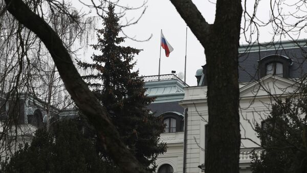 The Russian flag blows in the wind at the Russian embassy in Prague, Czech Republic, Monday, March 26, 2018 - Sputnik International