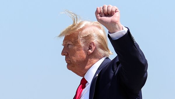 U.S. President Donald Trump gestures as he arrives at Bangor International Airport in Bangor, Maine, U.S., June 5, 2020 - Sputnik International