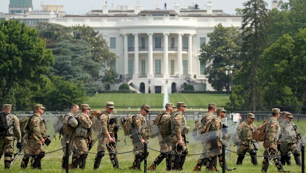 Uniformed military personnel walk in front of the White House ahead of a protest against racial inequality in the aftermath of the death in Minneapolis police custody of George Floyd, in Washington, U.S. June 6, 2020 - Sputnik International