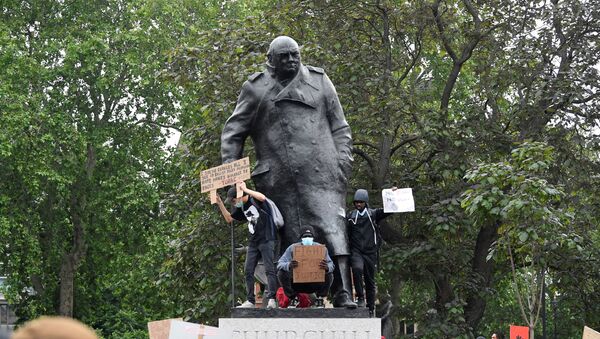 People climb on the Winston Churchill statue in Westminster during a Black Lives Matter protest following the death of George Floyd who died in police custody in Minneapolis, London, Britain, June 3, 2020.  - Sputnik International