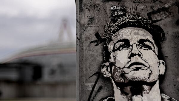 The image of Cristiano Ronaldo is painted on a mural outside the Juventus Stadium in Turin, Italy, Tuesday, May 19, 2020. Cristiano Ronaldo has reported back to Juventus’ training center after a 10-week absence. The five-time Ballon d’Or winner showed up for medical tests with the Serie A leader Tuesday, May 19, 2020 - Sputnik International