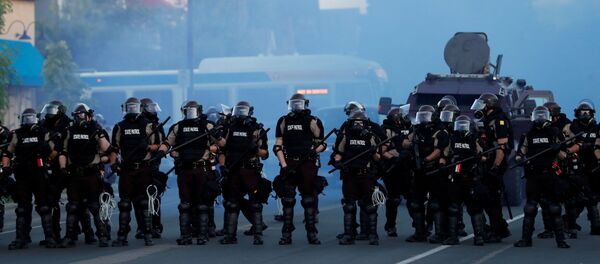 Security forces take position during a protest against the death in Minneapolis police custody of George Floyd, in Minneapolis, Minnesota, U.S., May 30, 2020 Security forces take position during a protest against the death in Minneapolis police custody of George Floyd, in Minneapolis, Minnesota, U.S., May 30, 2020 - Sputnik International