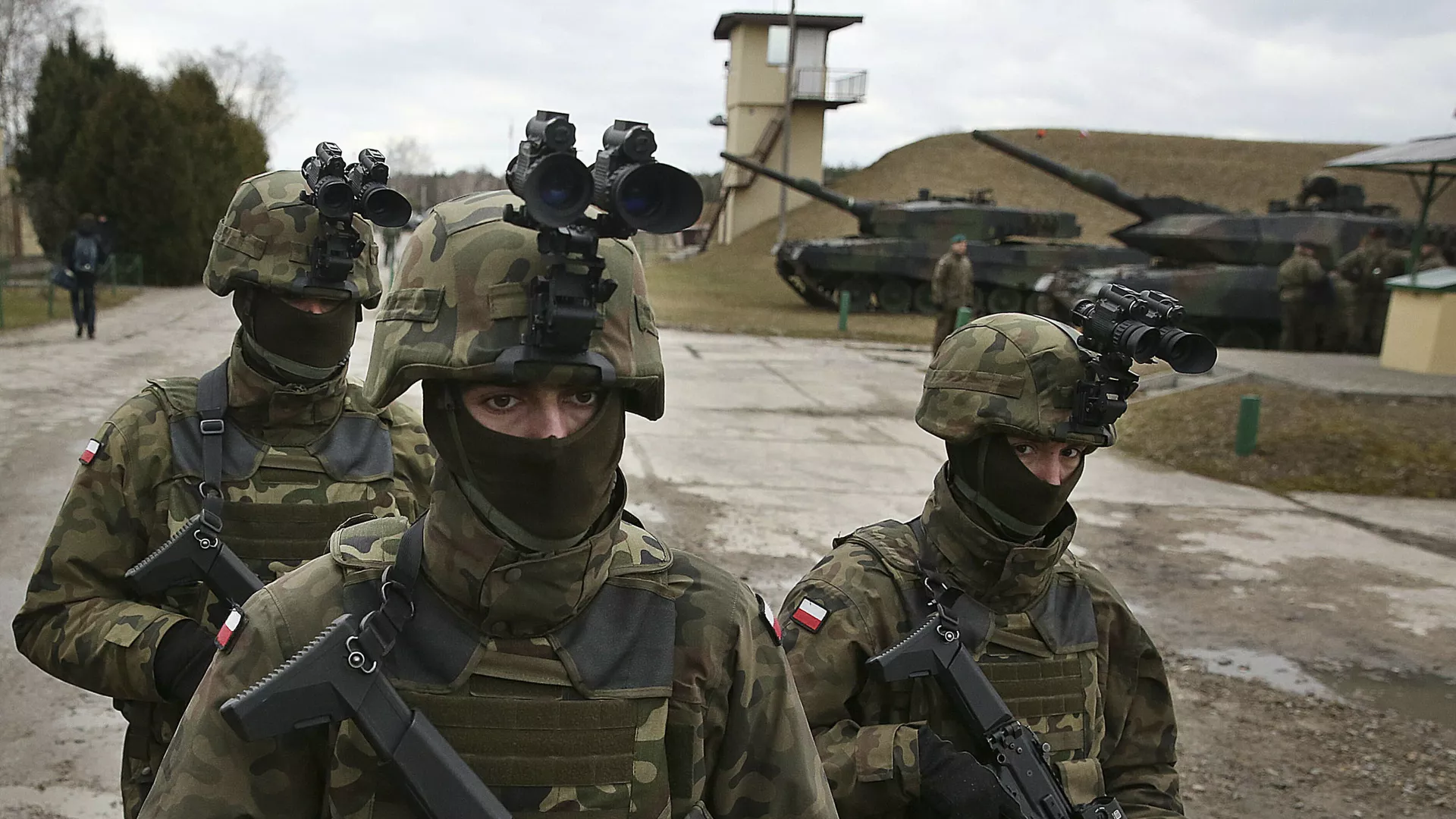 In this photo taken March 10, 2019, in Wesola,near Warsaw, central Poland, are seen Polish troops in combat gear during brief exercise with some other NATO forces marking 20 years since Poland, the Czech Republic and Hungary joined the Western military alliance - Sputnik International, 1920, 15.09.2023