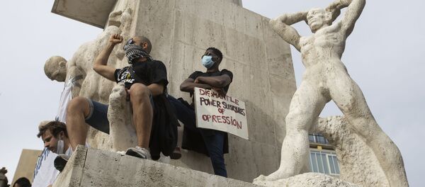 People take part in a Black Lives Matter protest in Amsterdam, Netherlands, Monday, June 1, 2020, to protest against the recent killing of George Floyd, a black man who died in police custody in Minneapolis, U.S.A., after being restrained by police officers on Memorial Day - Sputnik International