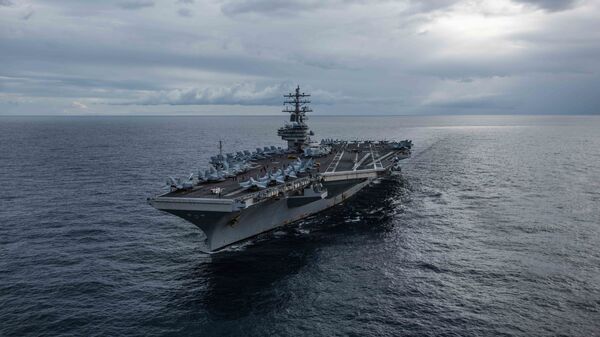  The U.S. Navy’s forward-deployed aircraft carrier USS Ronald Reagan (CVN 76) cruises during Talisman Sabre 2019.  - Sputnik International