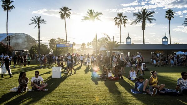 Festival goers attend the Coachella Music & Arts Festival at the Empire Polo Club on Friday, April 19, 2019, in Indio, Calif. - Sputnik International