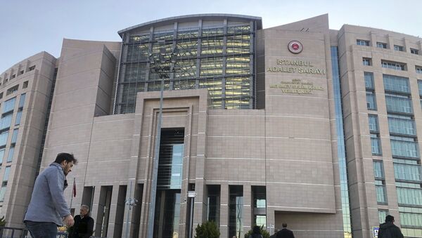 People walk to the Justice Palace as a trial against Metin Topuz, a Turkish employee of the United States Consulate in Istanbul charged with espionage and attempting to overthrow the Turkish government, began in Istanbul, Tuesday, March 26, 2019. - Sputnik International
