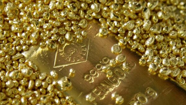 Gold bars and granules are displayed in the Austrian Gold and Silver Separating Plant Oegussa in Vienna June 2, 2009. - Sputnik International
