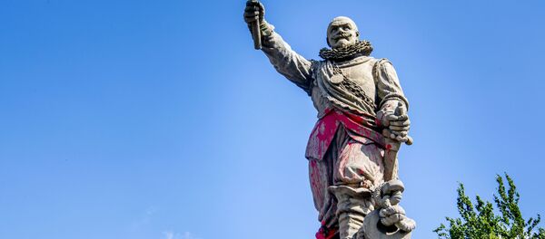 The statue of Dutch lieutenant admiral and commander of the West India Company Piet Hein in Rotterdam-Delfshaven is daubed and smeared with red paint (unseen)on June 12, 2020. - Dutch protesters on June 12, 2020, damaged the statues of a colonialist naval commander linked to the slave trade and of a murdered far-right politician, in the latest incidents targeting statues in Europe and the United States. The statue of Piet Hein -- a 17th-century admiral linked to the Dutch West India Trading Company who is regarded as one of the Netherlands' greatest naval heroes -- was sprayed with the words killer and thief overnight in Rotterdam. The statue of Dutch lieutenant admiral and commander of the West India Company Piet Hein in Rotterdam-Delfshaven is daubed and smeared with red paint (unseen)on June 12, 2020. - Dutch protesters on June 12, 2020, damaged the statues of a colonialist naval commander linked to the slave trade and of a murdered far-right politician, in the latest incidents targeting statues in Europe and the United States. The statue of Piet Hein -- a 17th-century admiral linked to the Dutch West India Trading Company who is regarded as one of the Netherlands' greatest naval heroes -- was sprayed with the words killer and thief overnight in Rotterdam. - Sputnik International