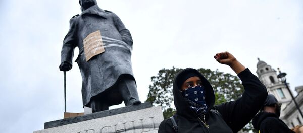 FILE PHOTO: A demonstrator reacts infront of graffiti on a statue of Winston Churchill in Parliament Square during a Black Lives Matter protest in London, following the death of George Floyd who died in police custody in Minneapolis, London, Britain, June 7, 2020. FILE PHOTO: A demonstrator reacts infront of graffiti on a statue of Winston Churchill in Parliament Square during a Black Lives Matter protest in London, following the death of George Floyd who died in police custody in Minneapolis, London, Britain, June 7, 2020. - Sputnik International