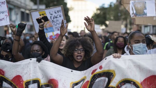 Hawa Traore chants during a march against police brutality and racism in Marseille, France, Saturday, June 13, 2020, organized by supporters of her brother Adama Traore, who died in police custody in 2016 - Sputnik International